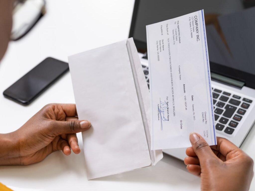 Paycheck envelope on a desk
