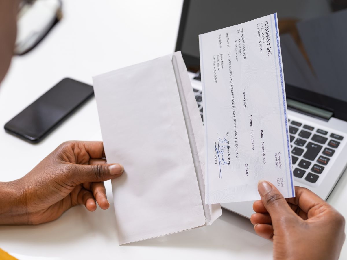 Paycheck envelope on a desk