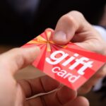 Gift cards fanned out on a table