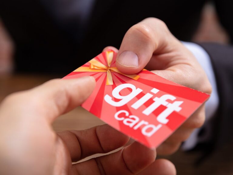 Gift cards fanned out on a table