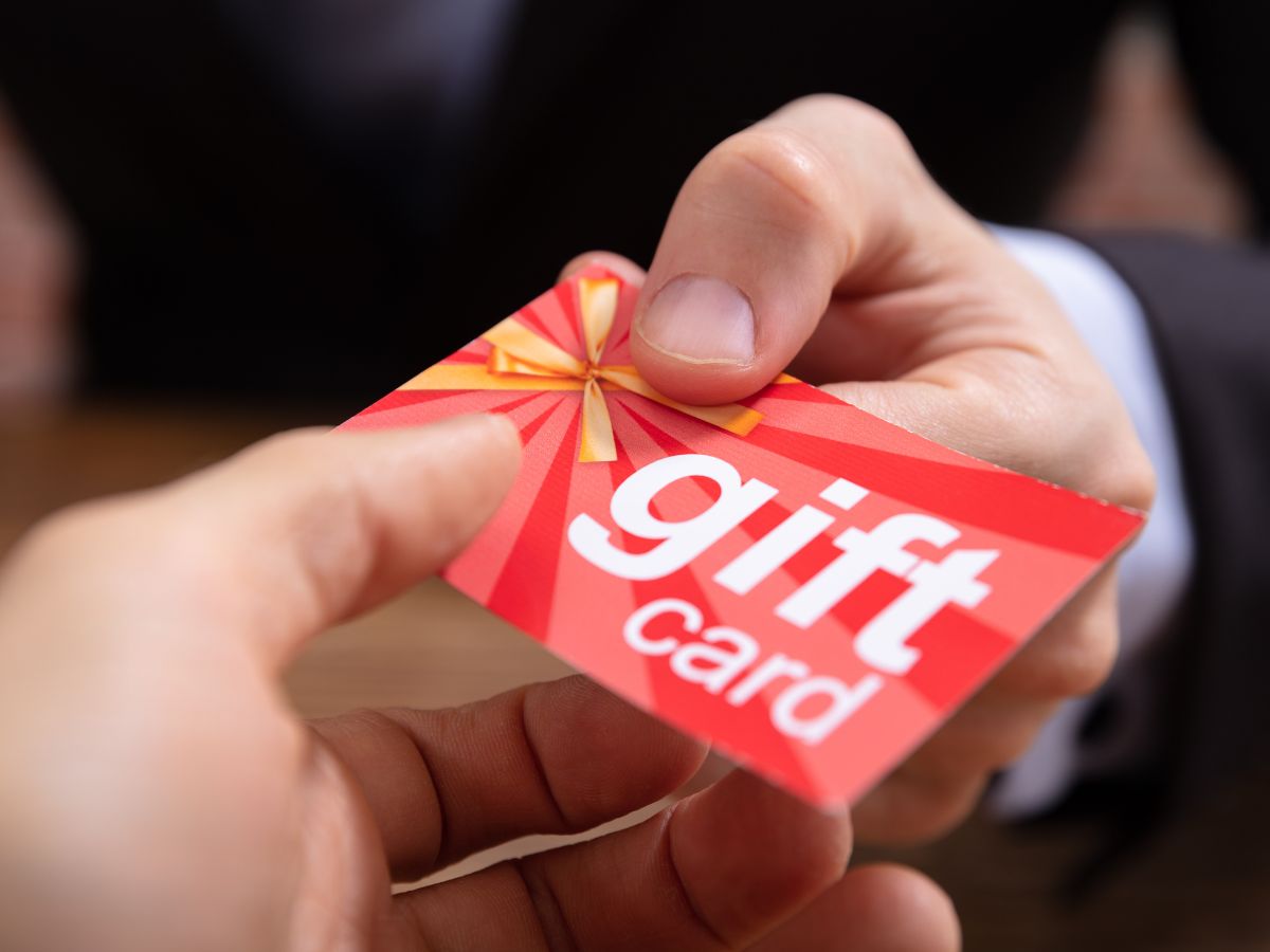 Gift cards fanned out on a table