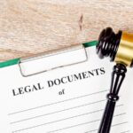 Settlement notice paperwork on a desk
