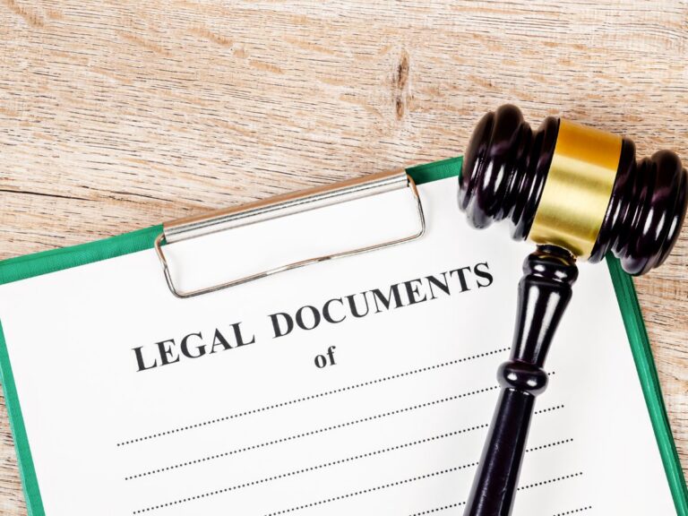 Settlement notice paperwork on a desk