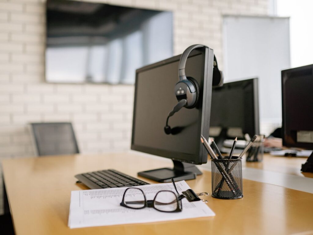 Work laptop and office equipment on a desk
